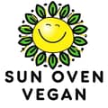 Sun Oven Vegan Logo of a happy sun and leaves around it. The Text is the company name: Sun Oven Vegan. British Columbia Canada. A downloadable vegan recipes book for Sun Ovens.